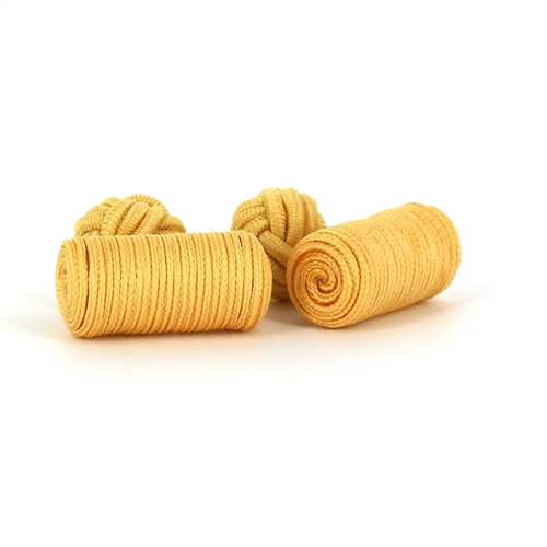 Goldene Fassärmelknöpfe