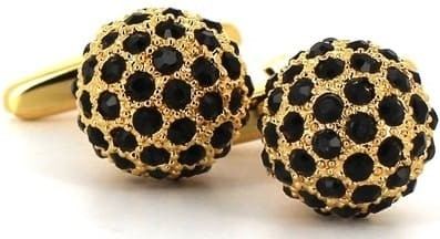 Goldene und schwarze Kugelärmelknöpfe