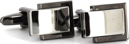 Silberne und schwarze Manschettenknöpfe