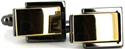 Goldene und schwarze Manschettenknöpfe